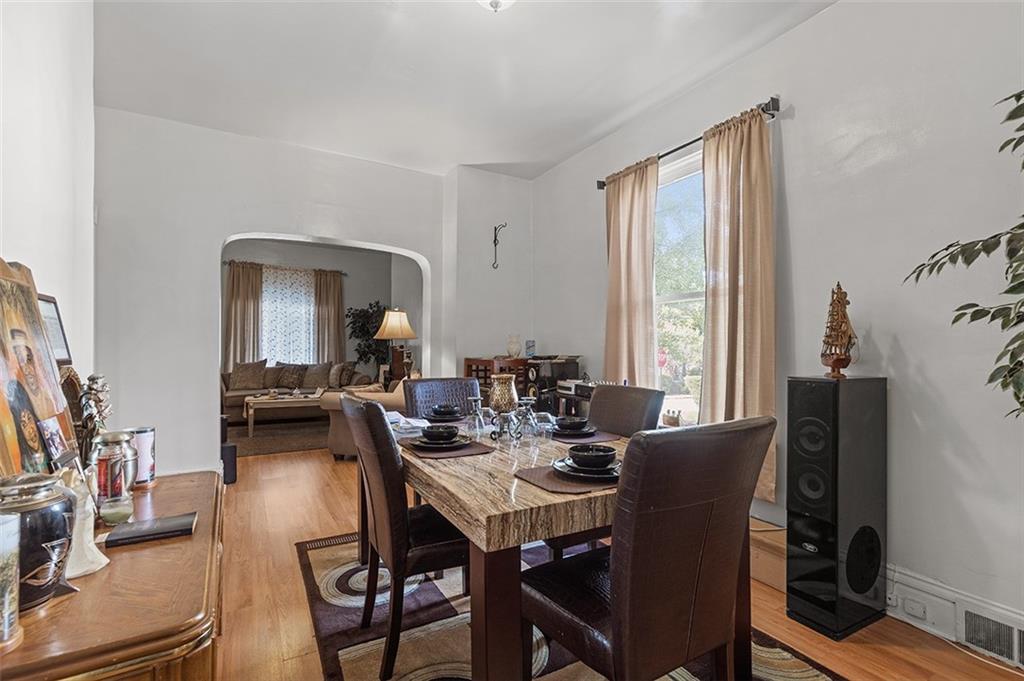 3124 Universal Street Pittsburgh, PA 15204 - Photo 14 of 30 a view of a dining room with furniture and window