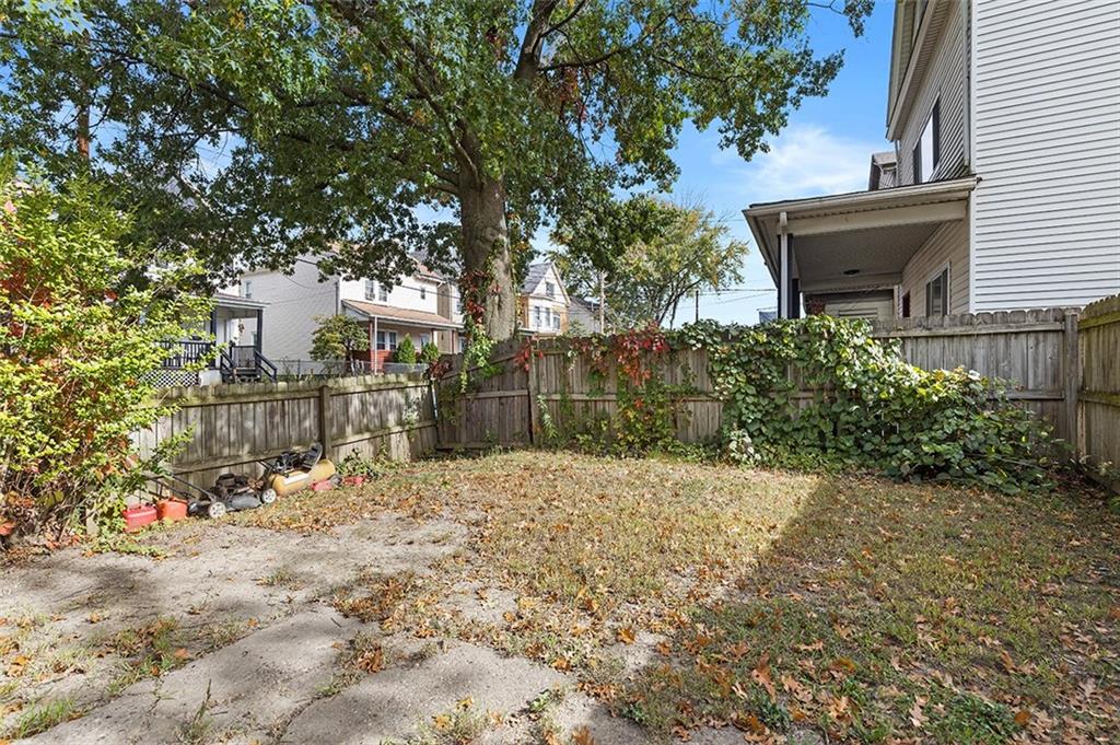 3124 Universal Street Pittsburgh, PA 15204 - Photo 29 of 30 a backyard of a house with lots of green space