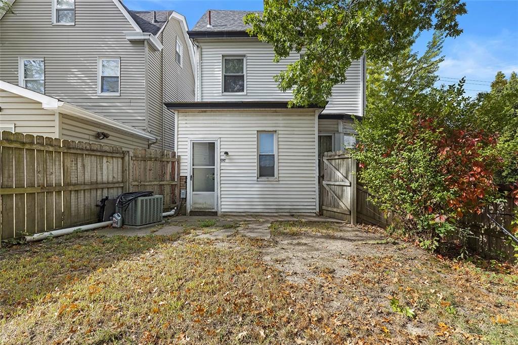 3124 Universal Street Pittsburgh, PA 15204 - Photo 30 of 30 a view of a house with a small yard and large tree