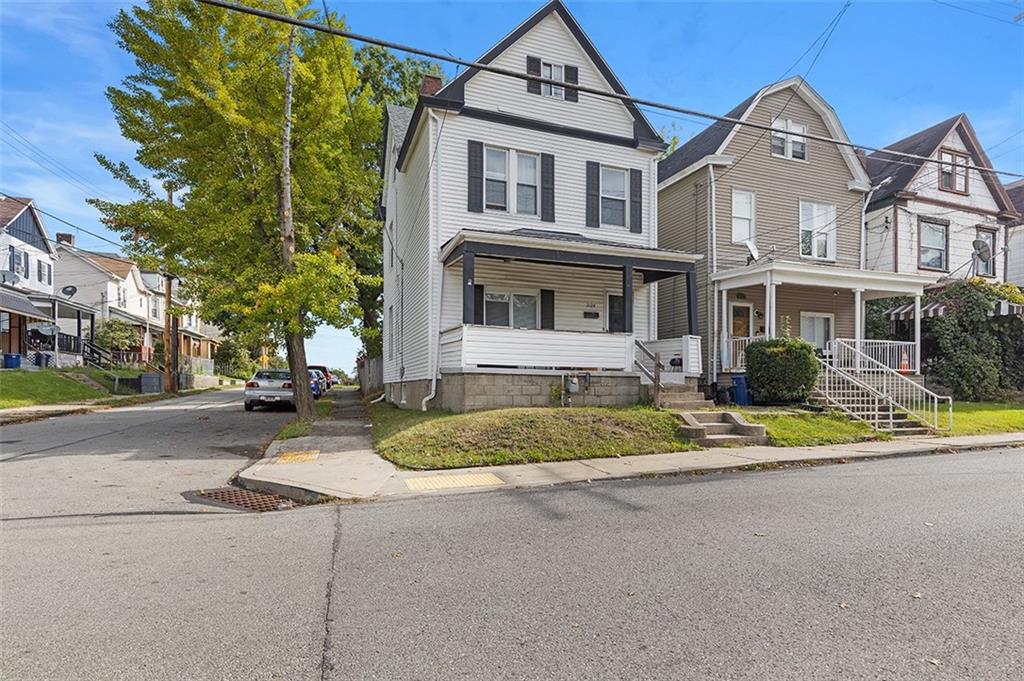 3124 Universal Street Pittsburgh, PA 15204 - Photo 3 of 30 front view of house with a yard