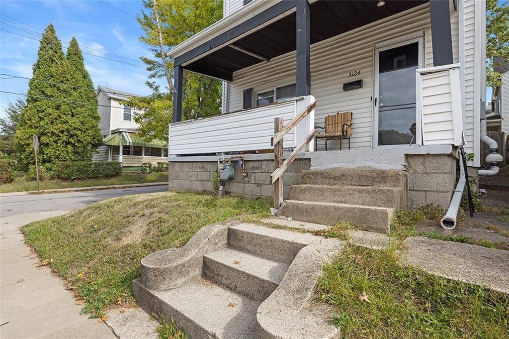 3124 Universal Street Pittsburgh, PA 15204 - Photo 4 of 30 front view of a house with a yard