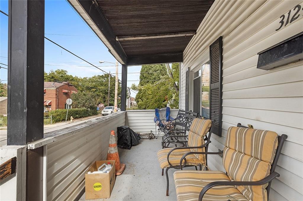 3124 Universal Street Pittsburgh, PA 15204 - Photo 5 of 30 a building outdoor space with seating