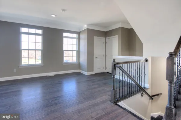 a large kitchen with stainless steel appliances granite countertop a large stove a sink dishwasher and a refrigerator