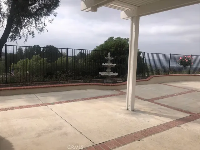 a view of backyard with green space