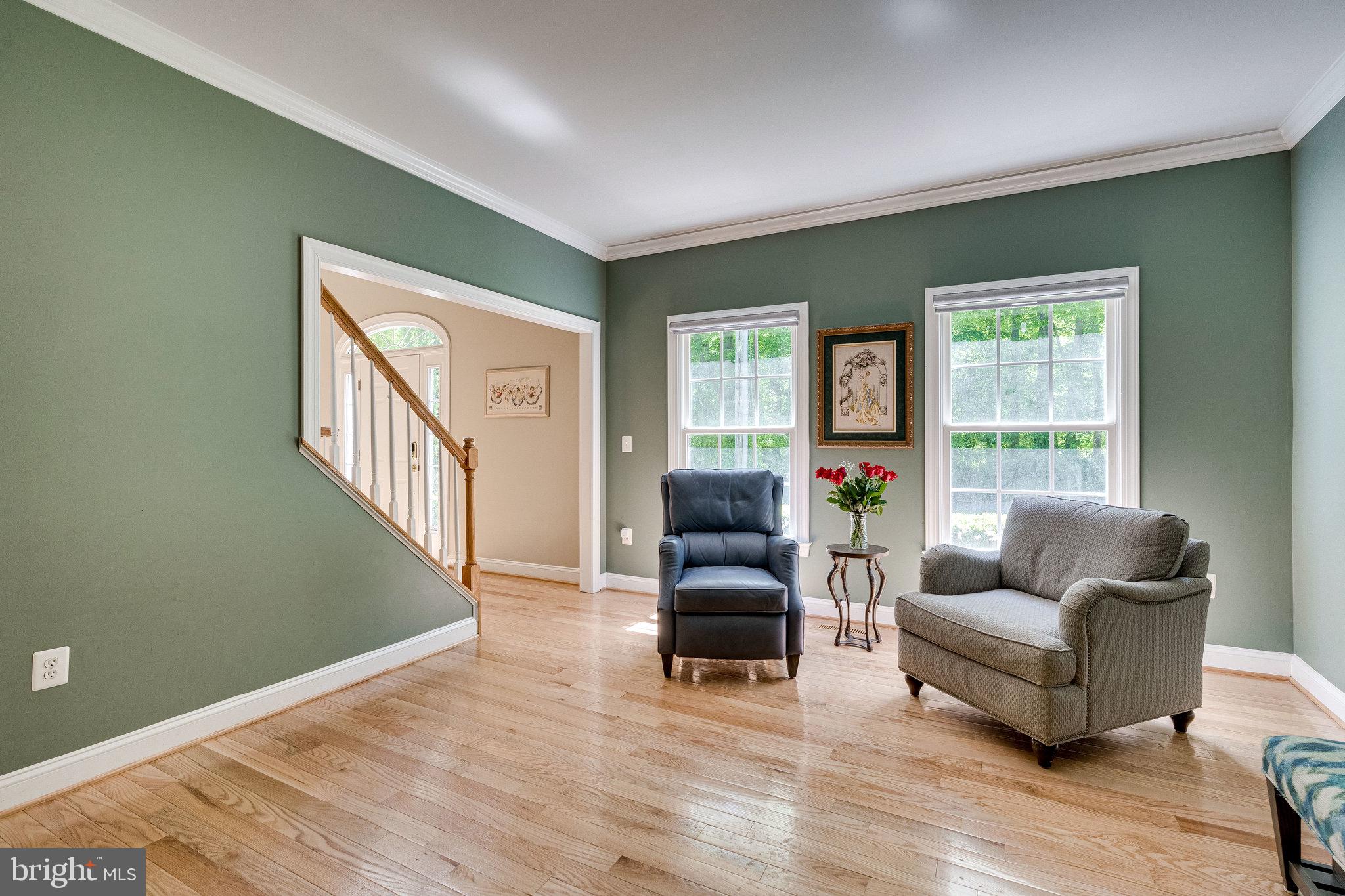 7802 Creekside View Lane Springfield, VA 22153 - Photo 33 of 107 a living room with furniture and a window