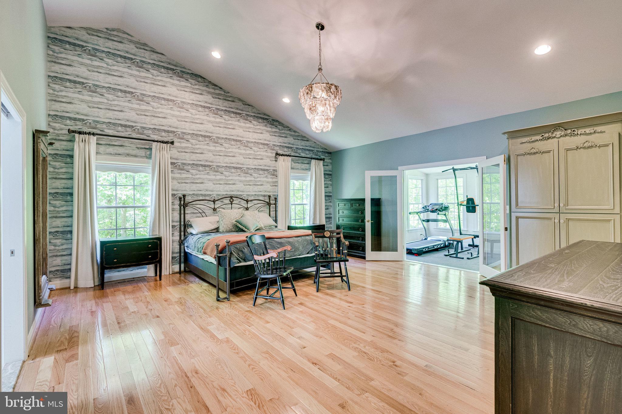 7802 Creekside View Lane Springfield, VA 22153 - Photo 39 of 107 a living room with furniture a window and a dining table