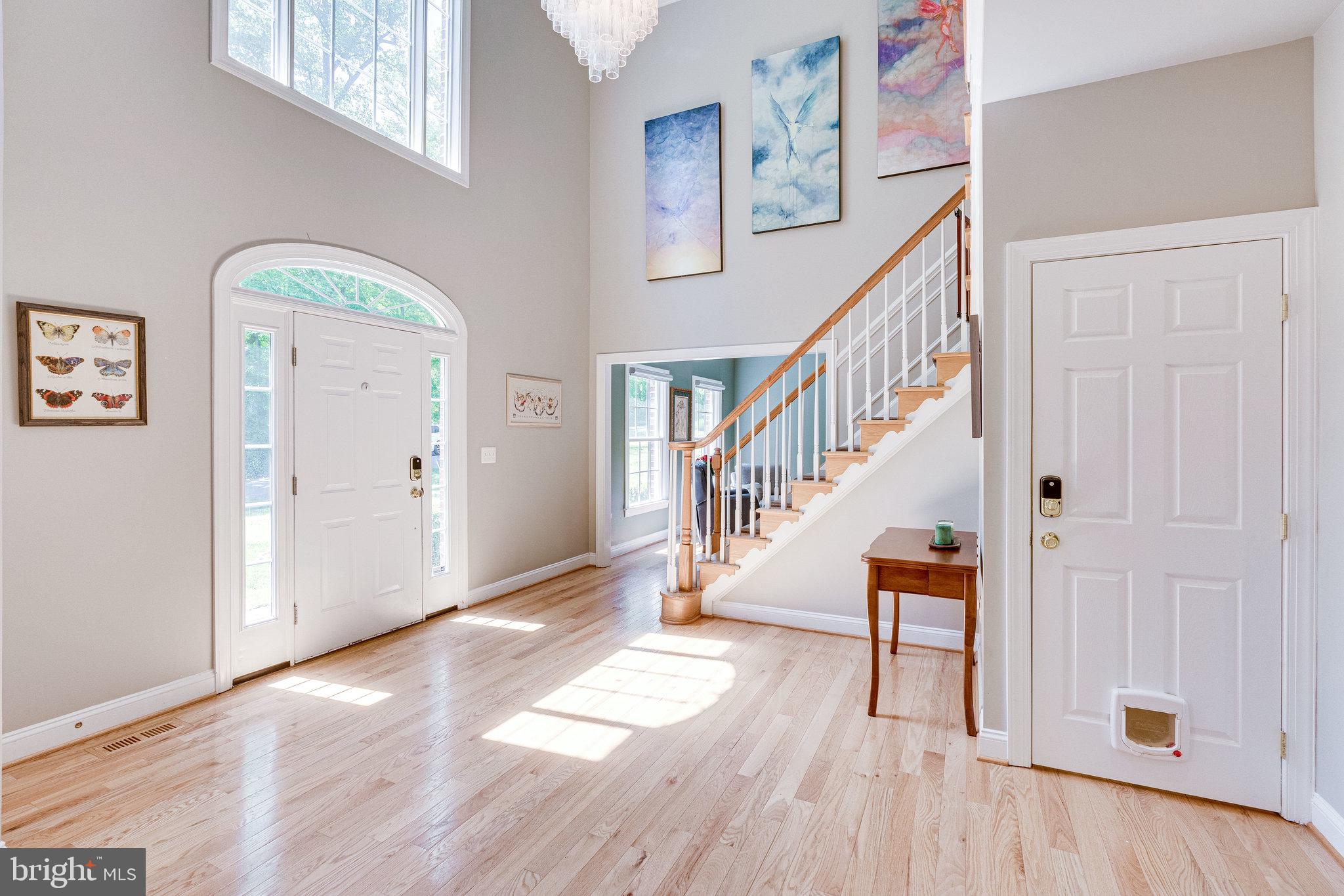 7802 Creekside View Lane Springfield, VA 22153 - Photo 4 of 107 a view of entryway with wooden floor