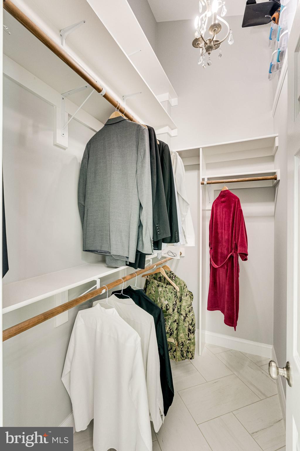 7802 Creekside View Lane Springfield, VA 22153 - Photo 54 of 107 a bedroom with a bed and a painting on the wall