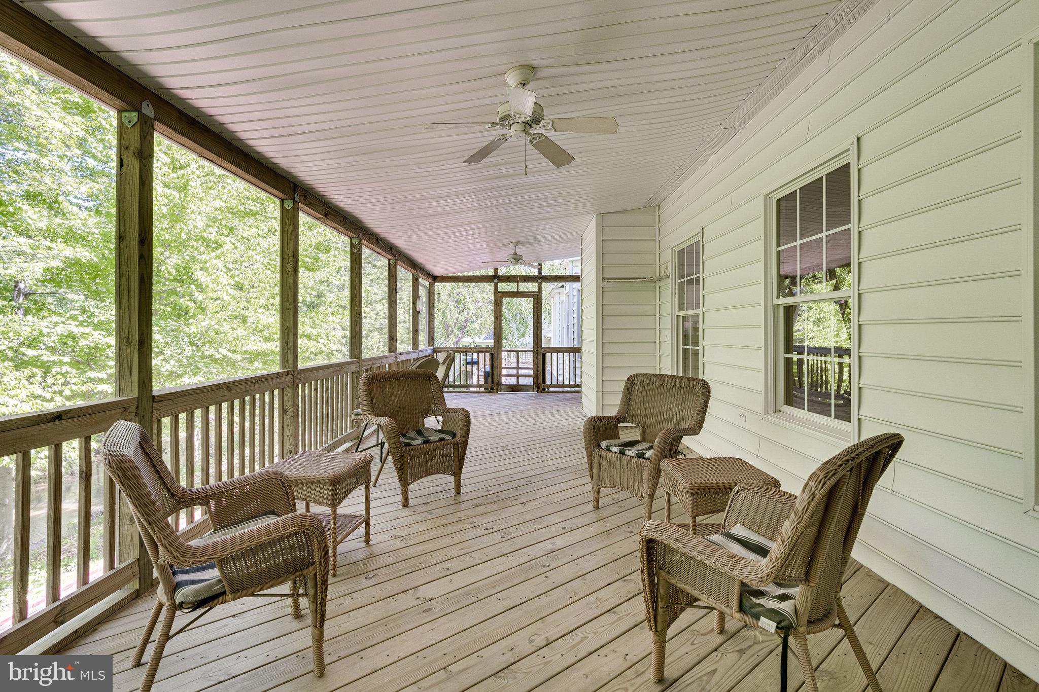 7802 Creekside View Lane Springfield, VA 22153 - Photo 57 of 107 a view of a patio with furniture