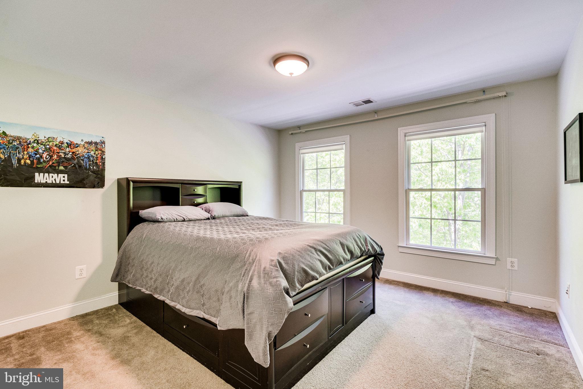 7802 Creekside View Lane Springfield, VA 22153 - Photo 74 of 107 a bedroom with a bed and a window