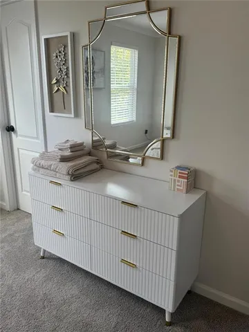 a bathroom with a sink double vanity and a mirror