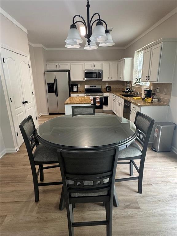 3926 Yosemite Park Lane Snellville, GA 30039 - Photo 8 of 10 a view of a dining room with furniture