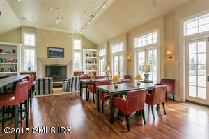 77 Havemeyer Lane, Unit 48 Stamford, CT 06902 - Photo 12 of 16 a view of a dining room with furniture window and wooden floor