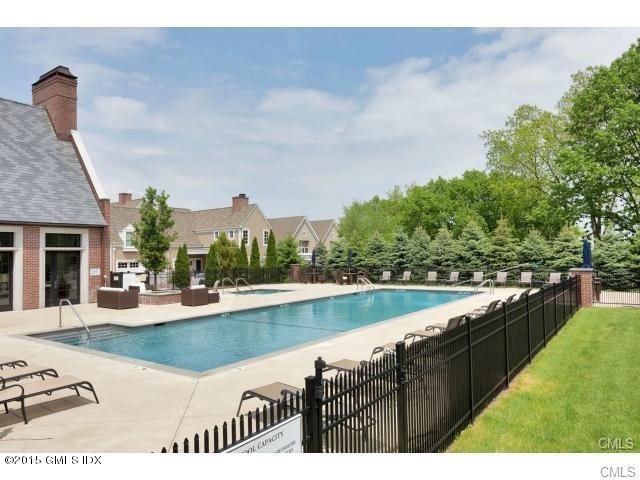 77 Havemeyer Lane, Unit 48 Stamford, CT 06902 - Photo 15 of 16 a view of a house with outdoor space and sitting area