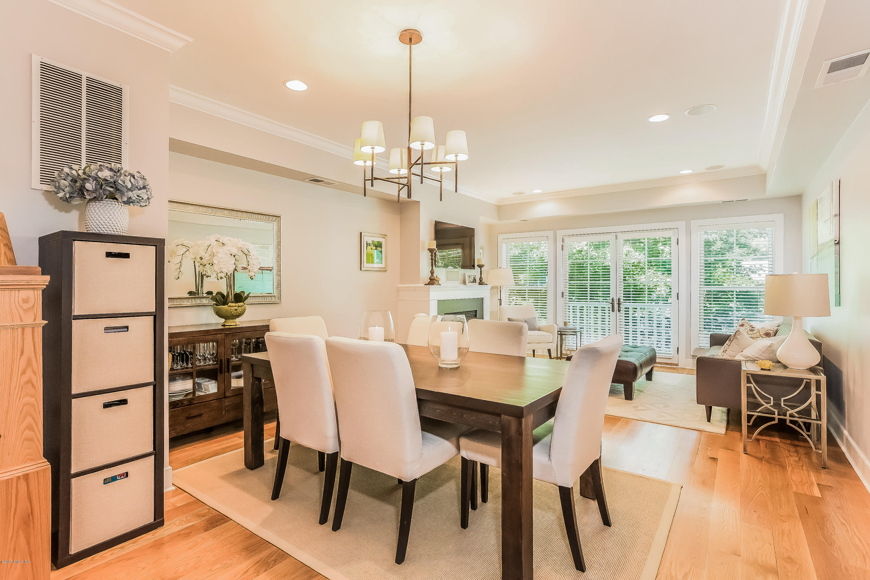 77 Havemeyer Lane, Unit 48 Stamford, CT 06902 - Photo 4 of 16 a dining room with furniture and window