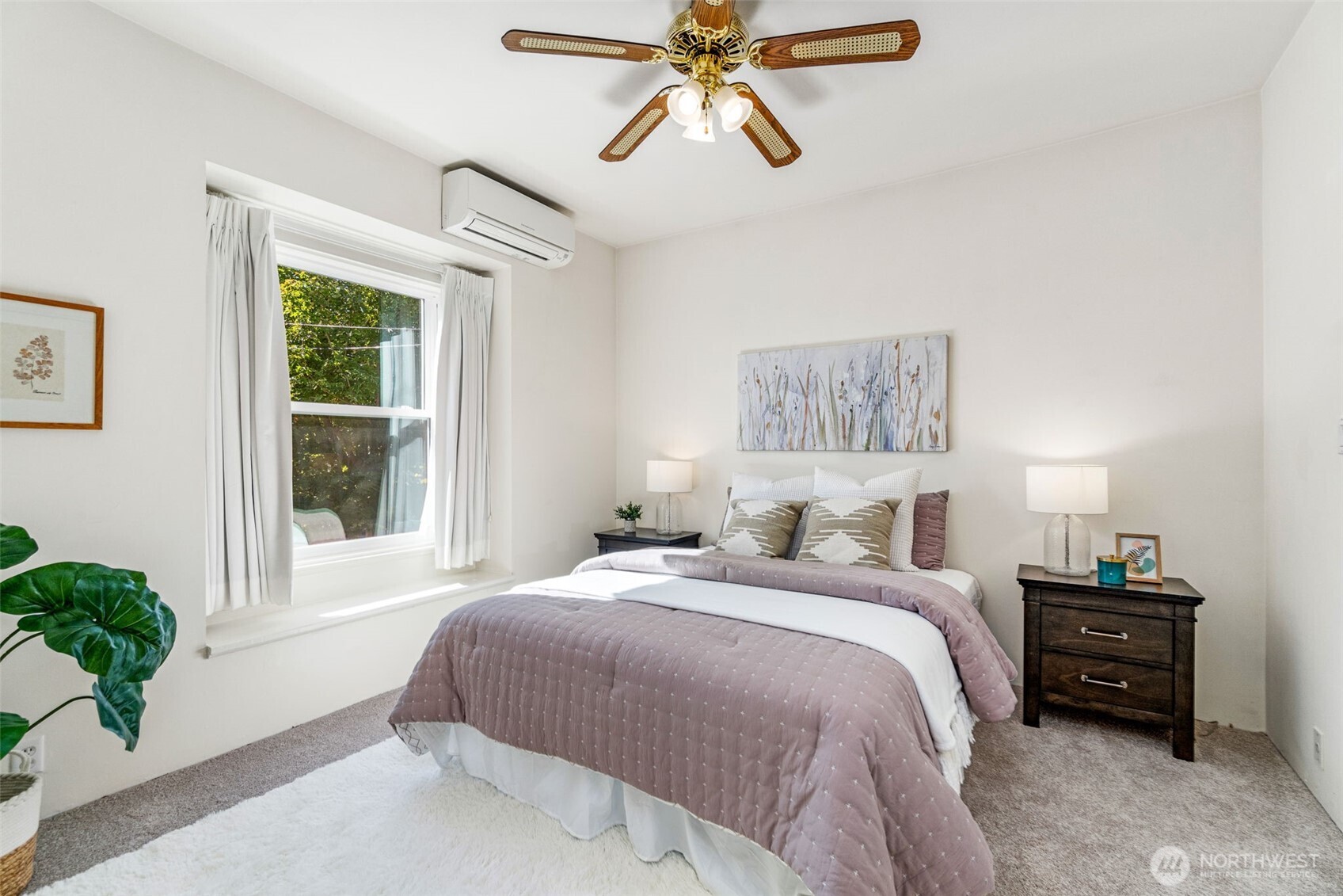 2358 Northwest 73rd Street Seattle, WA 98117 - Photo 12 of 18 a bedroom with a bed and a window