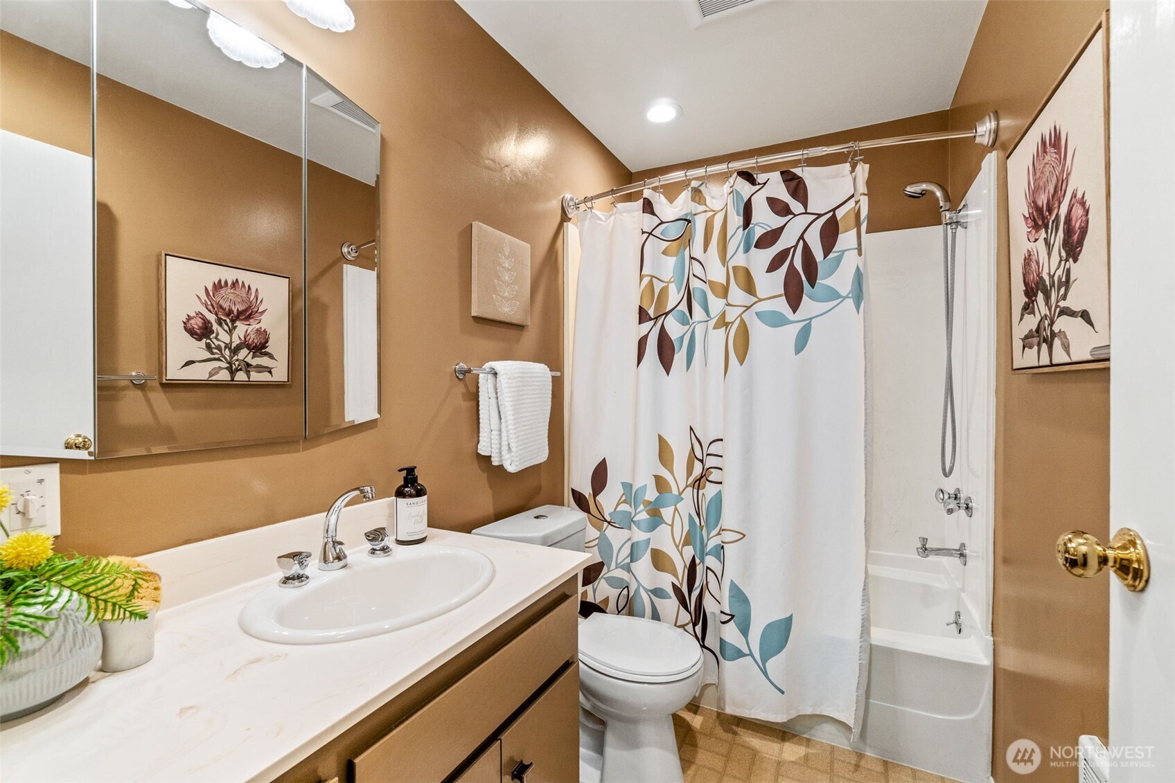2358 Northwest 73rd Street Seattle, WA 98117 - Photo 14 of 18 a bathroom with a sink toilet and shower