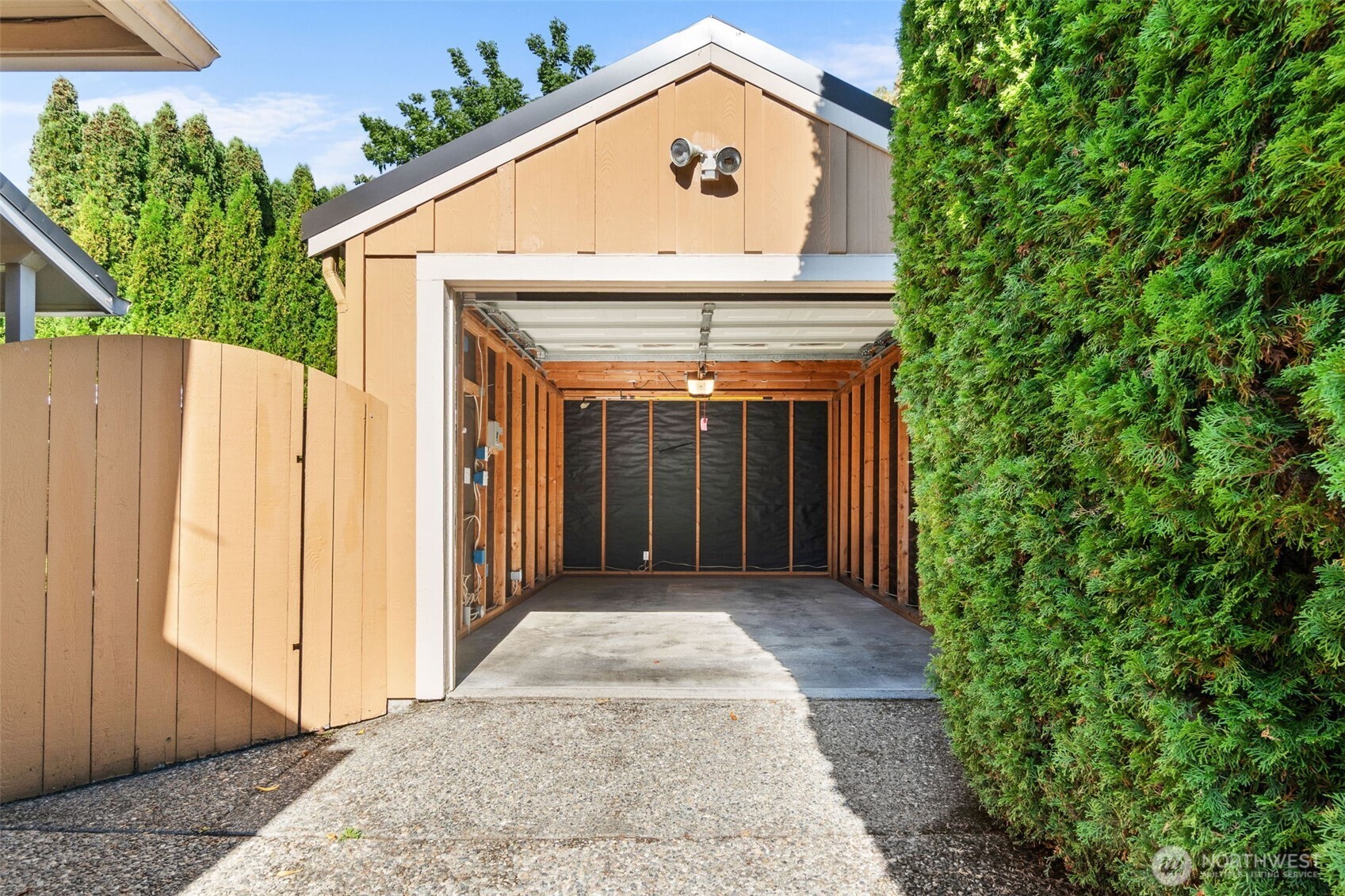 2358 Northwest 73rd Street Seattle, WA 98117 - Photo 17 of 18 a front view of a house with a garden