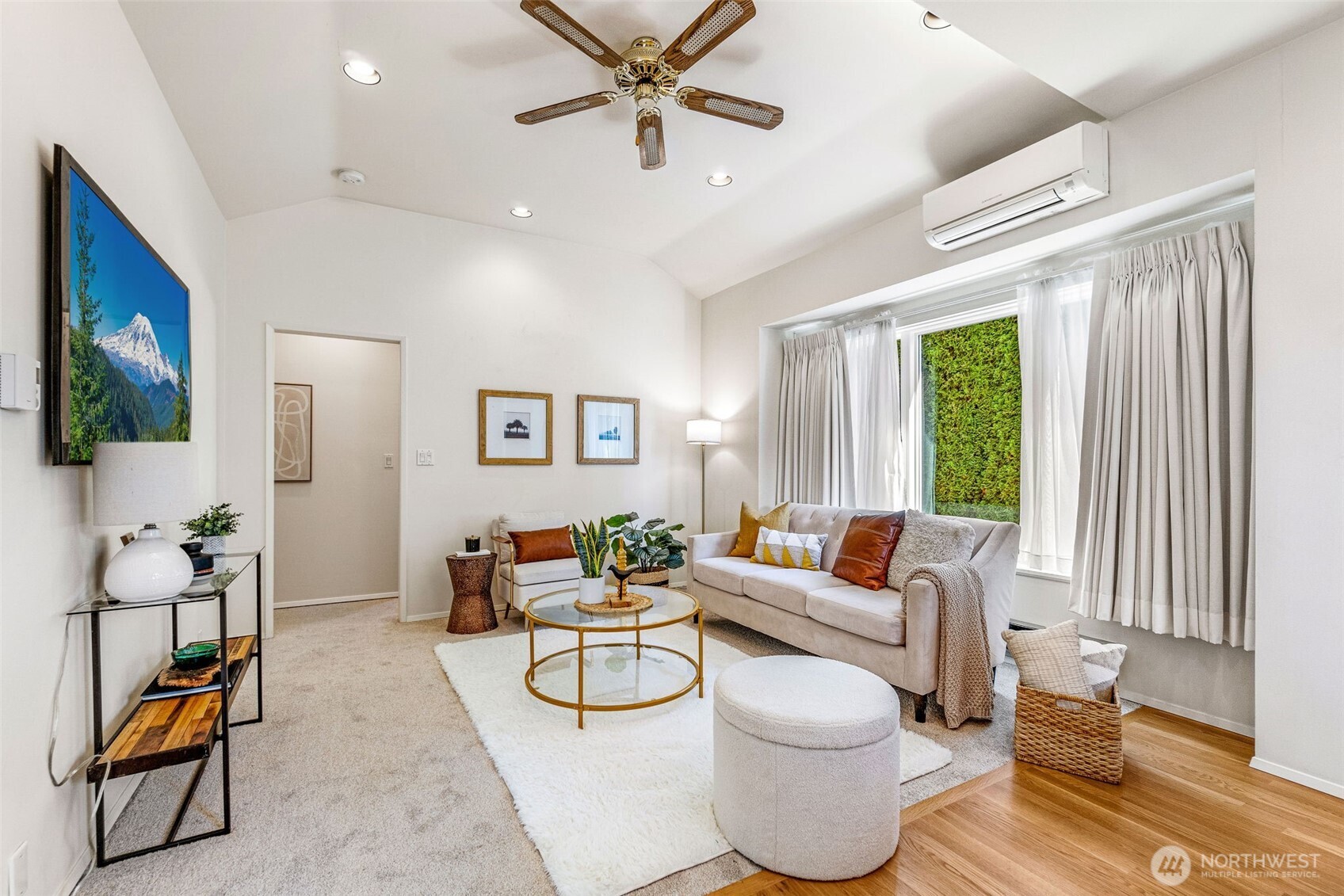 2358 Northwest 73rd Street Seattle, WA 98117 - Photo 3 of 18 a living room with furniture and a flat screen tv