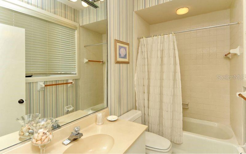 619 Cedars Court Longboat Key, FL 34228 - Photo 20 of 95 a bathroom with a sink and toilet