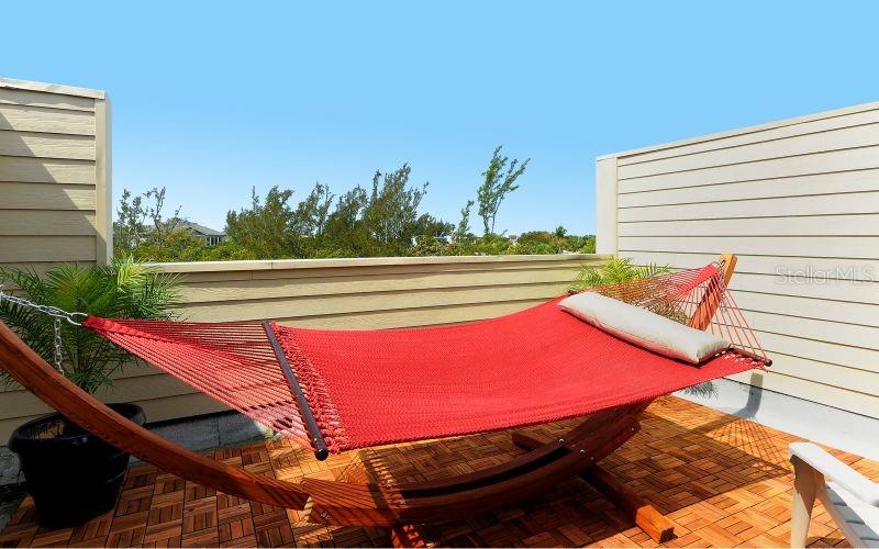 619 Cedars Court Longboat Key, FL 34228 - Photo 22 of 95 a view of a outdoor space with seating area