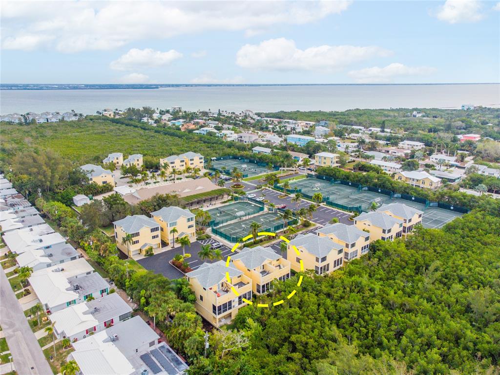 619 Cedars Court Longboat Key, FL 34228 - Photo 7 of 95 an aerial view of a city with lots of residential buildings