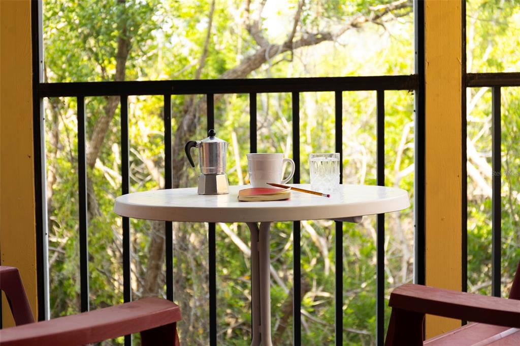 619 Cedars Court Longboat Key, FL 34228 - Photo 83 of 95 a view of a large window with an outdoor space