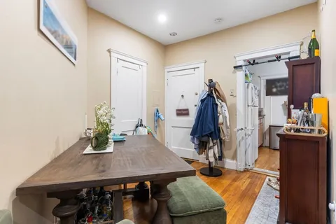 a view of a workspace with furniture