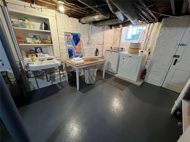 a utility room with dryer and washer