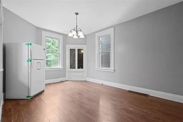 a view of livingroom with hardwood floor and window