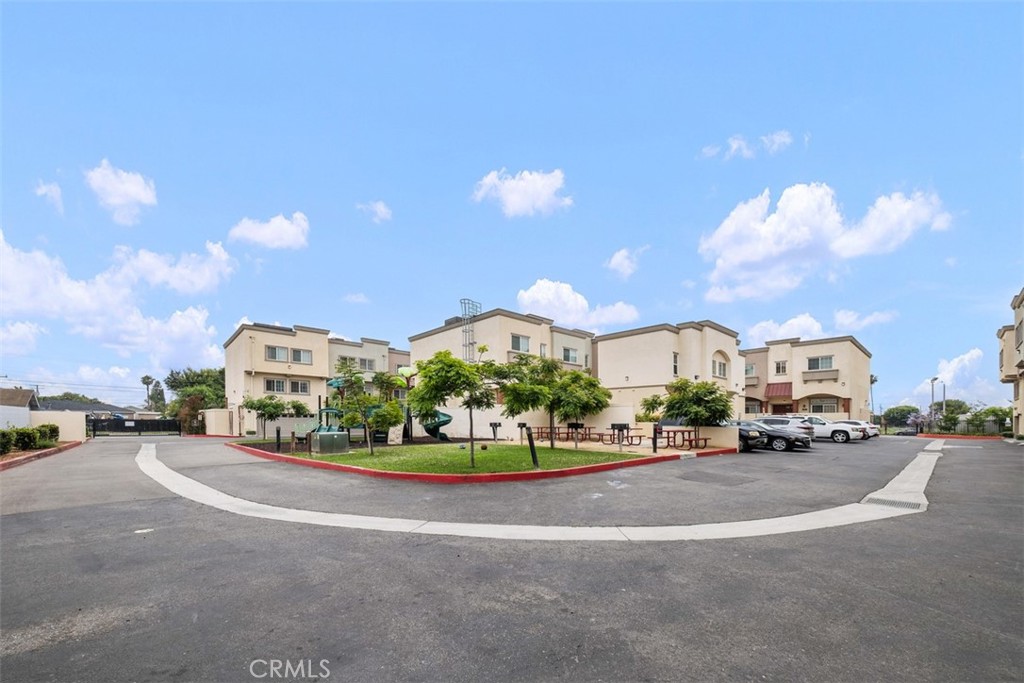 900 Dwight Avenue, Unit 108 Compton, CA 90220 - Photo 46 of 49 a view of a street with a building in the background