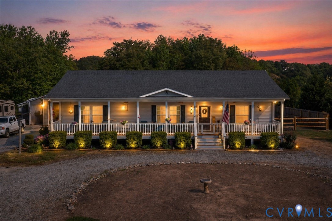 273 Greenfield Point Drive Reedville, VA 22539 - Photo 1 of 42 a front view of a house with a yard
