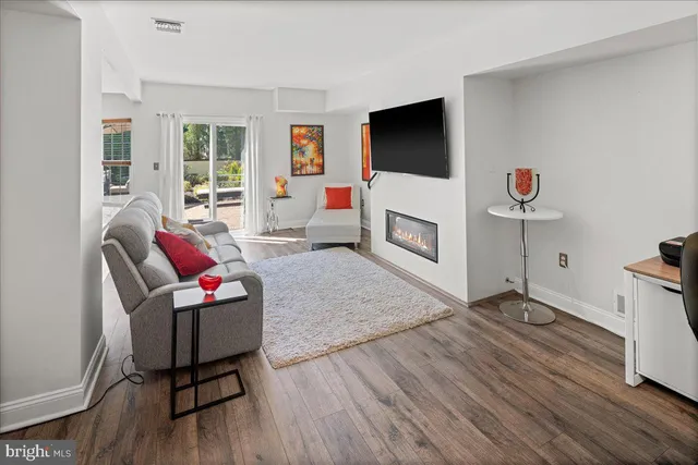 a backyard of a house with yard barbeque oven and outdoor seating