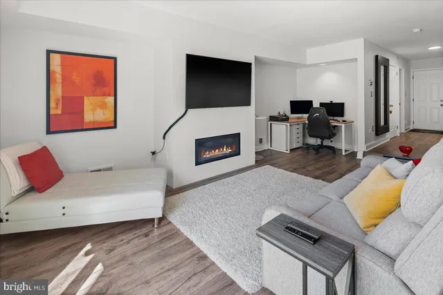 a view of backyard with outdoor seating a patio and a garden