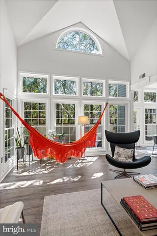 a bedroom with a bed and a table in it