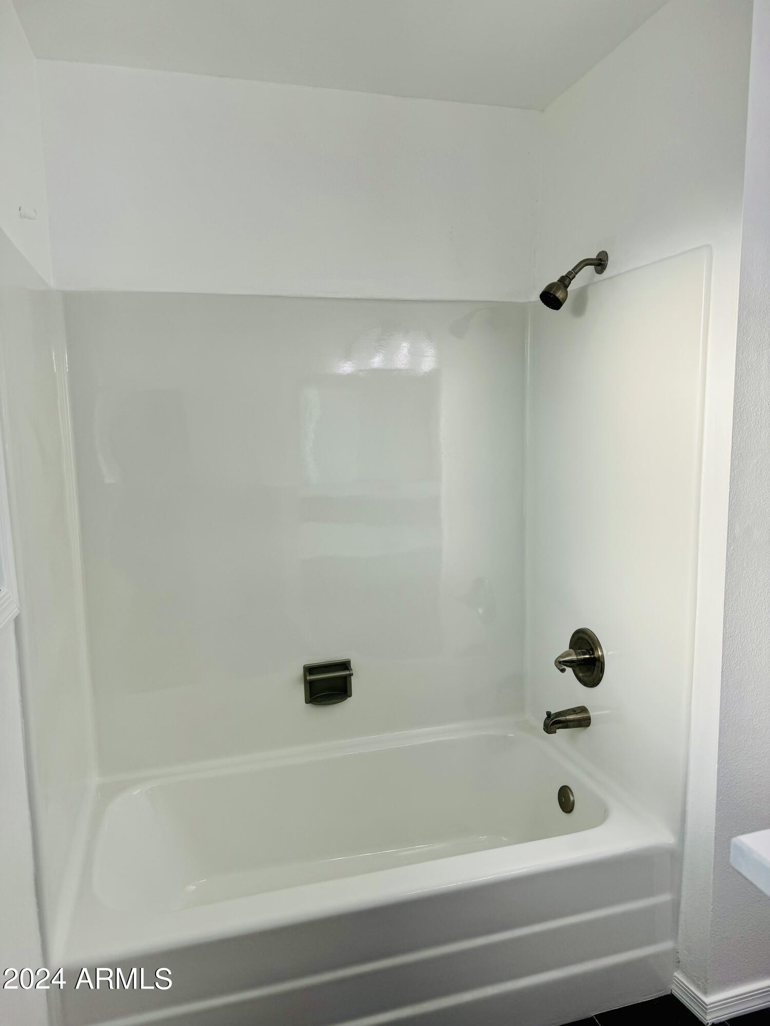 1216 East Riviera Drive Tempe, AZ 85282 - Photo 25 of 33 a bathroom with a bathtub