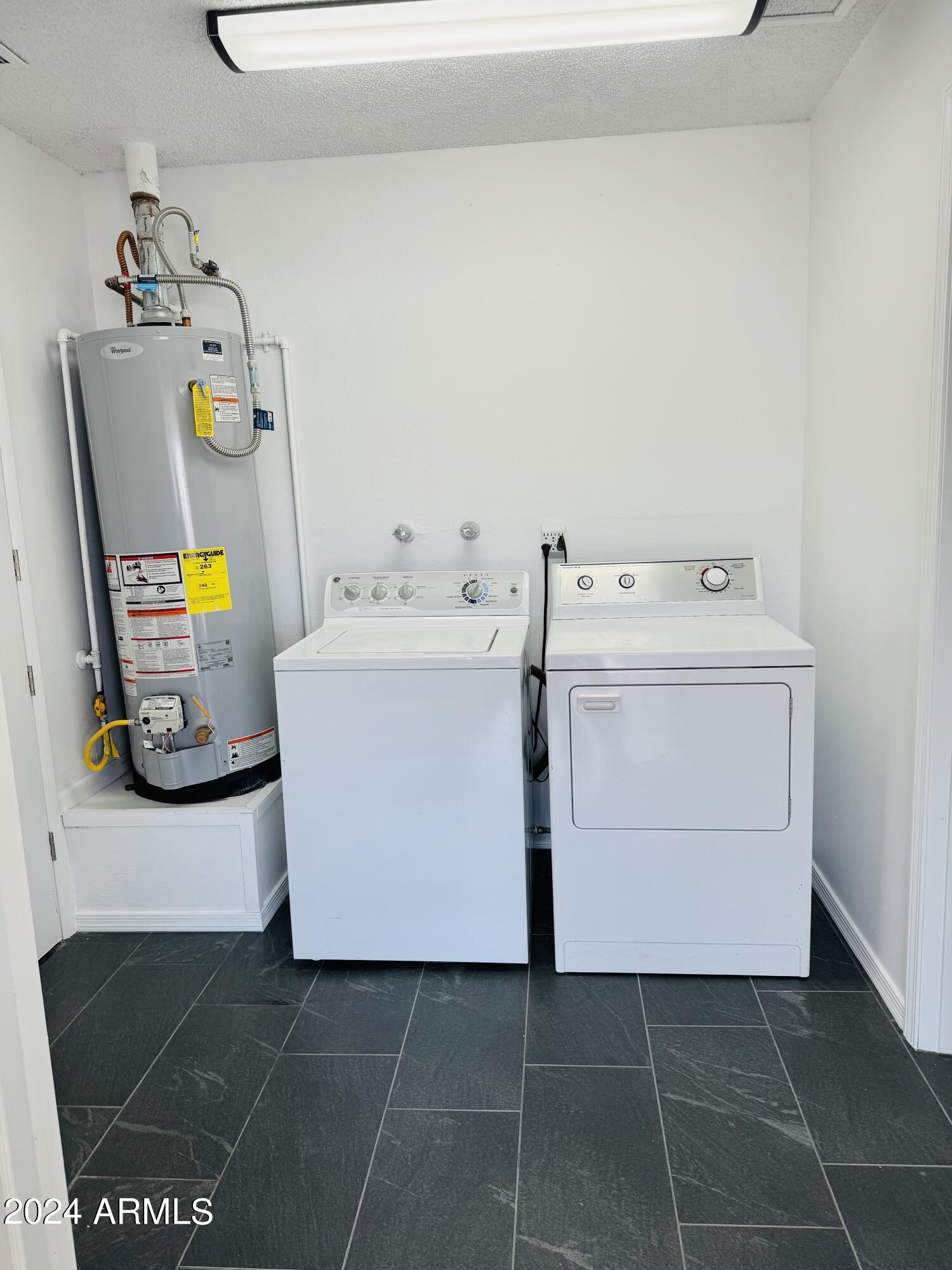 1216 East Riviera Drive Tempe, AZ 85282 - Photo 26 of 33 a utility room with dryer and washer
