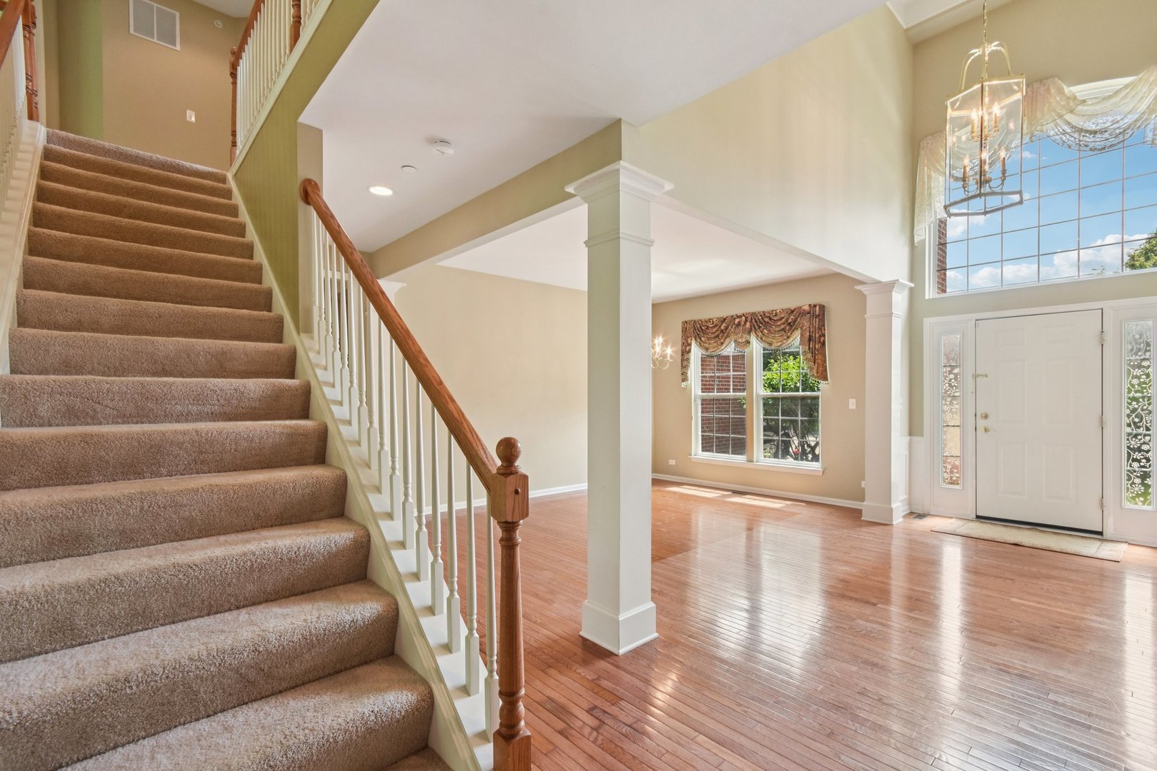 816 Blue Ridge Drive Streamwood, IL 60107 - Photo 18 of 46 a view of entryway and hall with wooden floor
