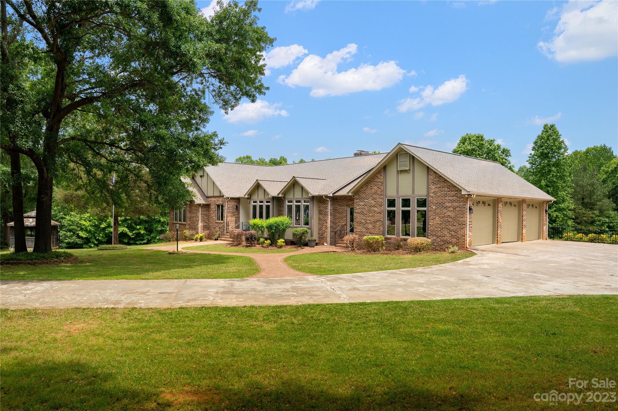 1807 David Drive Shelby, NC 28150 - Photo 1 of 37 a front view of a house with garden and porch