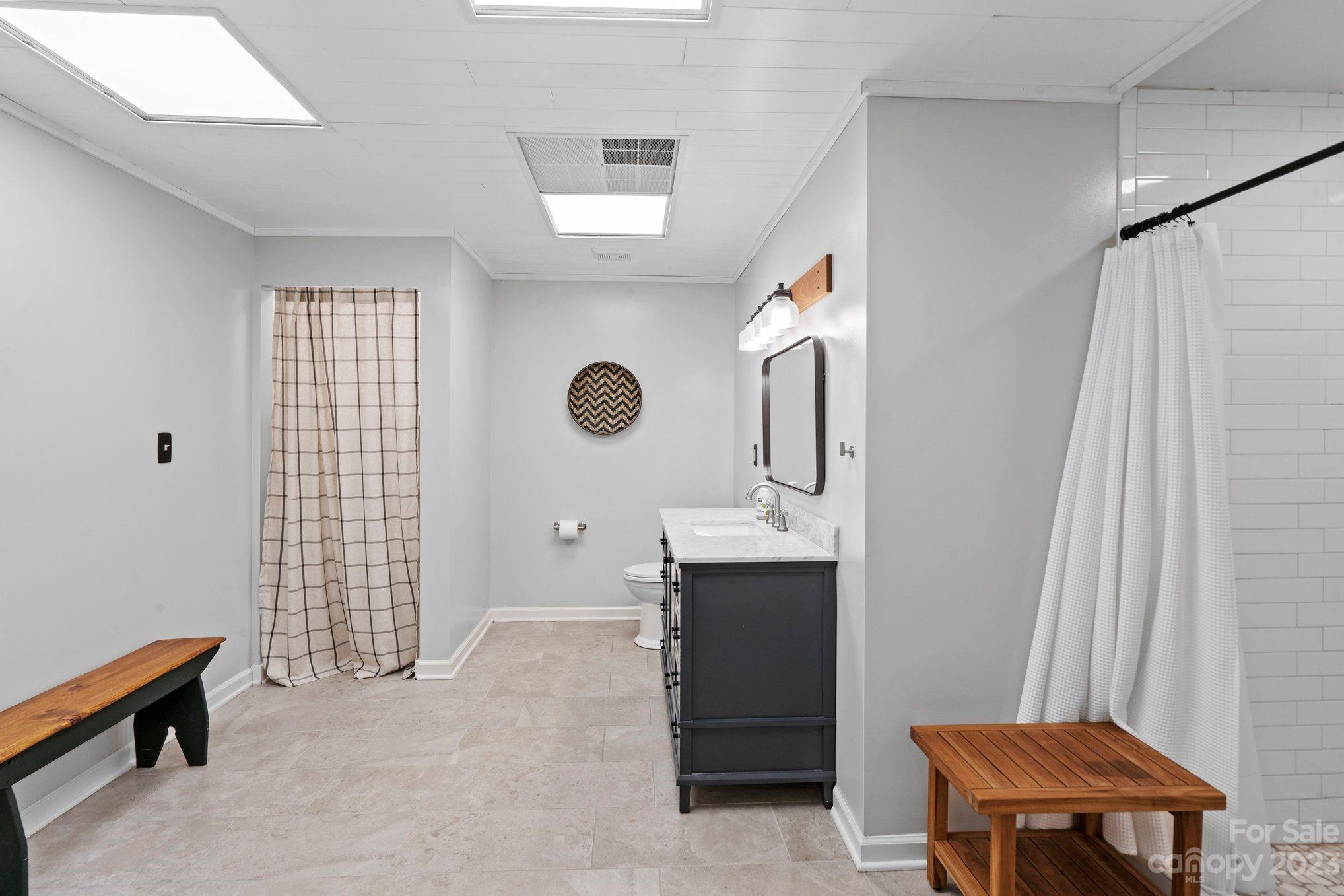 1807 David Drive Shelby, NC 28150 - Photo 24 of 37 a room that has a dresser and a chair in it