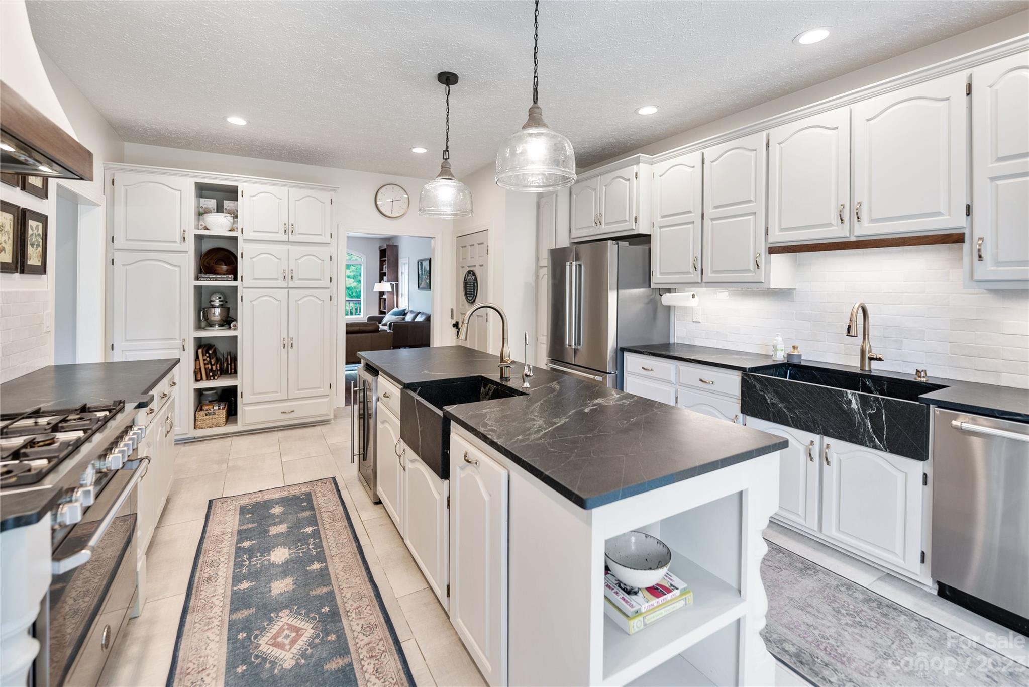 1807 David Drive Shelby, NC 28150 - Photo 5 of 37 a kitchen with stainless steel appliances a stove a sink a refrigerator and a center island
