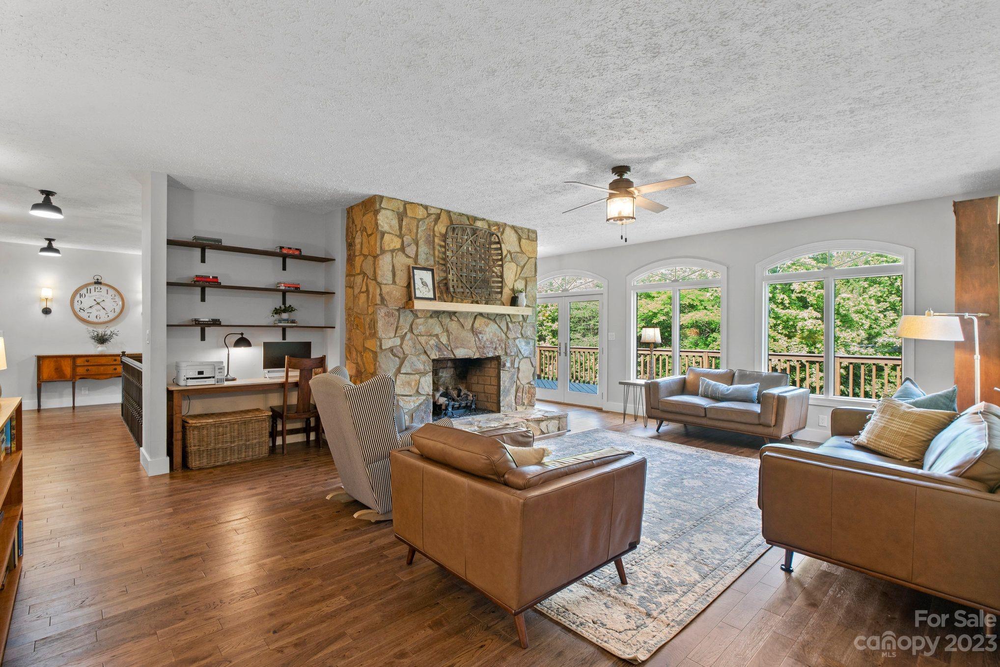 1807 David Drive Shelby, NC 28150 - Photo 9 of 37 a living room with furniture fireplace and a large window