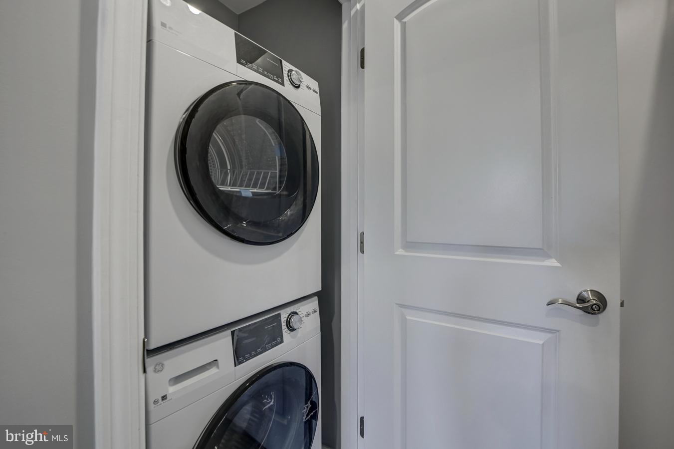 832 19th Street Northeast, Unit B Washington, DC 20002 - Photo 8 of 21 a utility room with dryer and washer