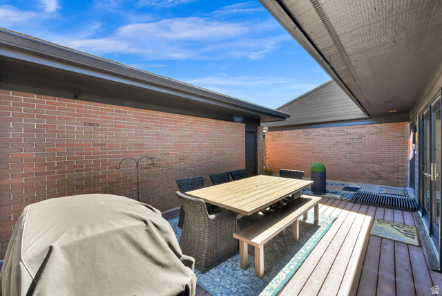 2314 Ridgewood Way Bountiful, UT 84010 - Photo 24 of 26 Private outdoor patio featuring brick walls and wood-finish decking
