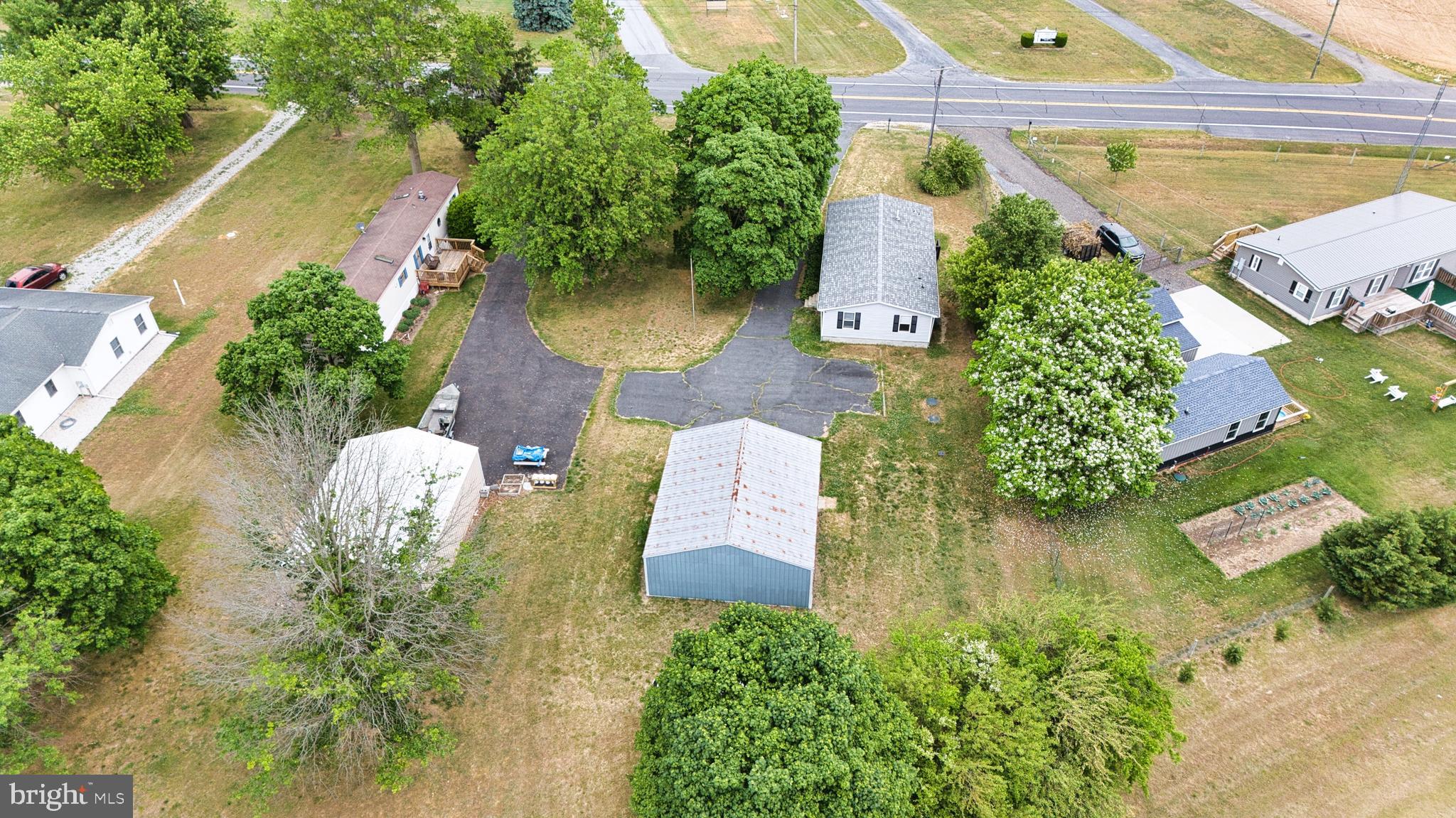 23212 Argos Corner Road Milford, DE 19963 - Photo 25 of 36 an aerial view of a house with outdoor space
