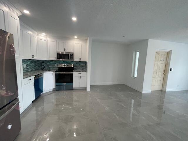 1012 Green Pine Boulevard, Unit E2 West Palm Beach, FL 33409 - Photo 3 of 53 IMG_4755