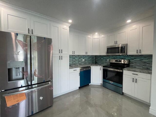 1012 Green Pine Boulevard, Unit E2 West Palm Beach, FL 33409 - Photo 4 of 53 IMG_4756