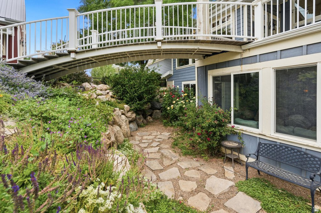 672 Perry Hollow Drive Mapleton, UT 84664 - Photo 105 of 106 Stone pathway winding through extensive landscaping