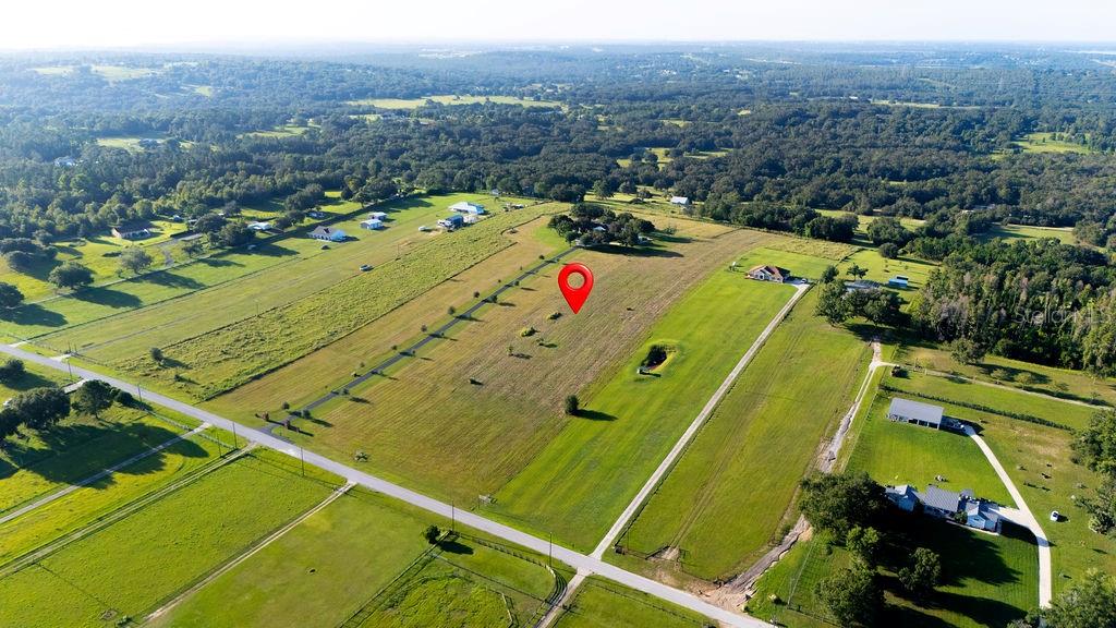 12066 Bruce Hunt Road Clermont, FL 34715 - Photo 7 of 18 a view of a tennis court