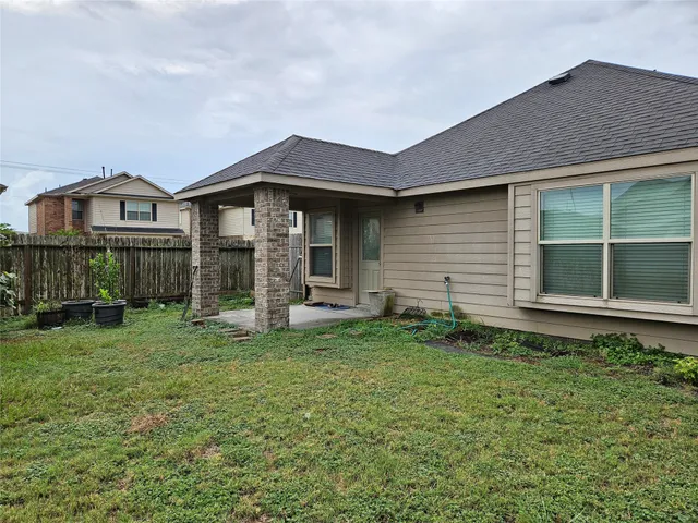 a house view with a garden space